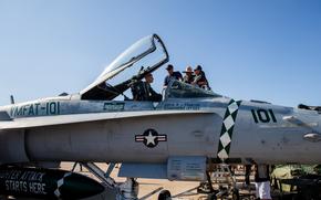 Spectators tour a U.S. Marine Corps F/A-18 Hornet during the 2023 Marine Corps Air Station Miramar Airshow in San Diego, Sept. 23, 2023. America's Airshow 2023 is a unique and incredible opportunity to witness Marine and joint aviation capabilities, civilian performers, and the world-famous Blue Angels; to interact first-hand with Marines, other service members, and first responders; and to see first-hand the innovative spirit of the Marine Corps through emerging technologies and forward-thinking. (U.S. Marine Corps photo by Staff Sgt. Dana Beesley)