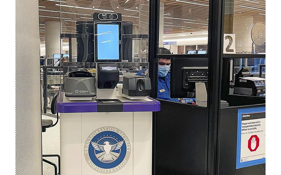 A TSA security checkpoint at Los Angeles International Airport uses facial recognition technology to verify passenger identities. 