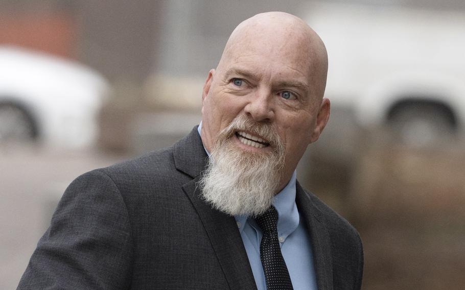Richard Barnett, an Arkansas man who was photographed with his feet on a desk in former House Speaker Nancy Pelosi’s office during the Jan. 6 U.S. Capitol riot, arrives at federal court in Washington, Jan. 10, 2023. Barnett was sentenced Wednesday, May 24, 2023, to more than four years in prison. U.S. District Judge Christopher Cooper said that Barnett became one of the faces of the Jan. 6 riot, and at times he seemed to enjoy the notoriety. 