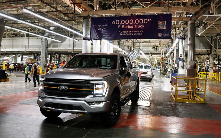 The 40 millionth Ford Motor Co. F-Series truck rolls off the assembly line at the Ford Dearborn Truck Plant on Jan. 26, 2022, in Dearborn, Mich. Michigan automakers would be hit by continued shortages of computer chips, as semiconductor plants deal with cutbacks in Ukrainian supplies of the neon they need for lasers. Higher prices for palladium, used in catalytic converters and a major Russian export, would also affect carmakers.