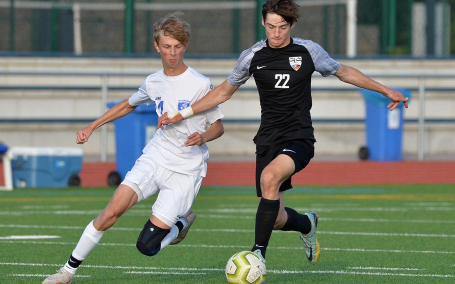 Wiesbaden’s Jacob Goodman and Stuttgart’s Christian Groves battle for the ball in the boys Division I final at the DODEA-Europe soccer championships in Ramstein, Germany, May 18, 2023. Stuttgart beat Wiesbaden 2-1 to win the title