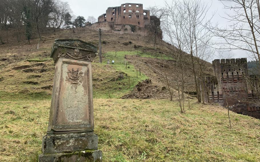 A weathered memorial stands near a Protestant church below Frankenstein Castle, about 12 miles east of Kaiserslautern on Sunday, Jan. 23, 2022.