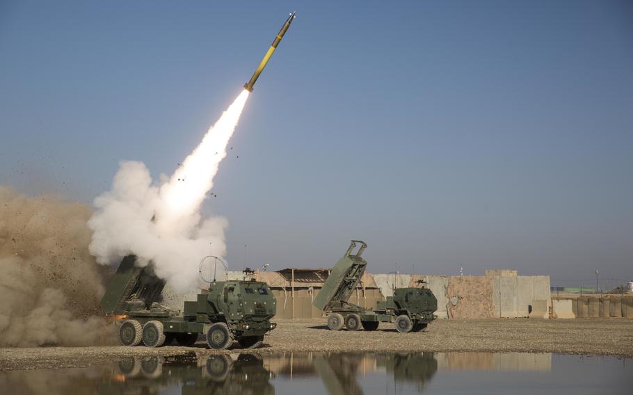 Marines fire a High Mobility Artillery Rocket System, or HIMARS, at Camp Shorab in the Helmand Province, Afghanistan, in February 2019.
