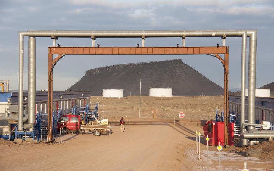 Mount Dundas is framed by the piping that carries all the utilities for heat and water. There is no digging, or building on, the permafrost.