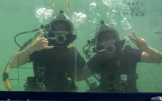 SAN PEDRO, Calif. — Engineering Aide Second Class (EA2) Samson Baker reenlisted for four more years of service while fully submerged inside a diver tank during an Underwater Construction Team (UCT) TWO demonstration on Day 1 of Fleet Week 2025.



Naval Construction Group One (NCG 1) is homeported in Pt. Hueneme, California, and leads and manages the overall capability and readiness of its Naval Construction Regiments (NCR’s), Naval Mobile Construction Battalions (NMCB’s), Construction Battalion Maintenance Unit (CBMU), and Underwater Construction Team (UCT). NCG 1 provides the required engineering support that the Navy and Nation need to construct and maintain base facilities, repair battle damaged facilities, conduct defensive operations as required, and to meet disaster preparedness and recovery missions.