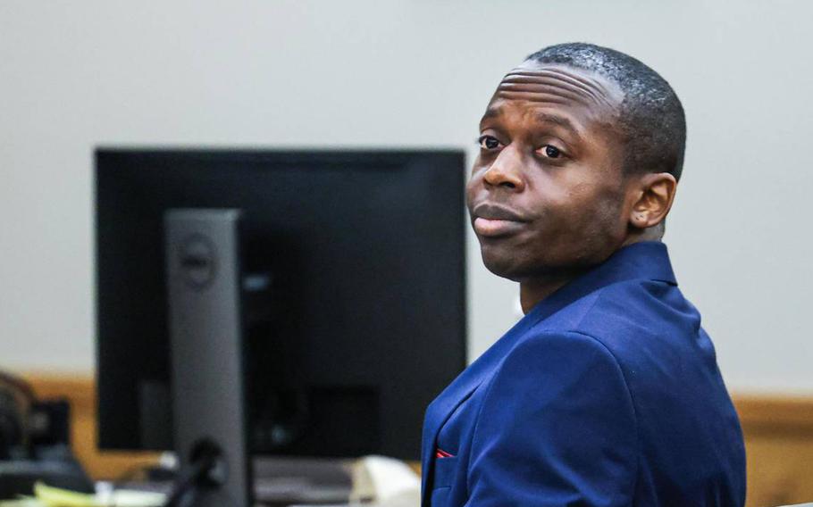 Defendant Fayaka Dunbar, a Marine Corps veteran, enters the courtroom where he begins his trial in Fort Worth on Tuesday, Sept. 12, 2023. Dunbar is accused of capital murder after allegedly shooting two people in 2017.