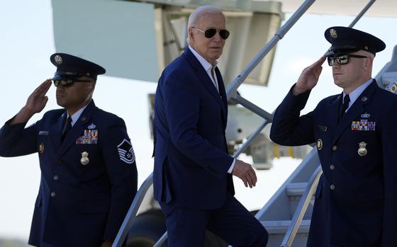 President Joe Biden boards Air Force One to depart Milwaukee Mitchell International Airport on May 8, 2024.