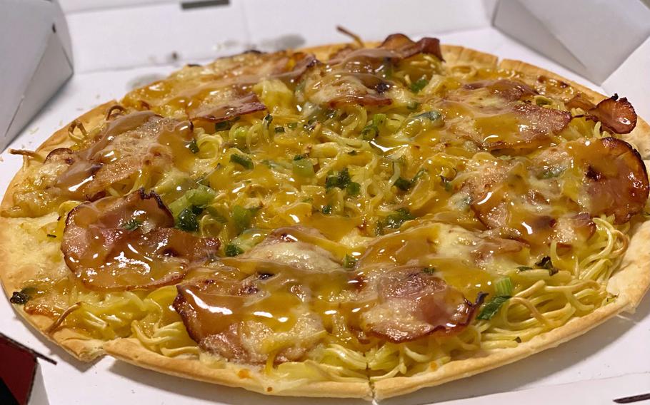 Kotteri-fuu Ramen Pizza is a collaboration between Pizza Hut and Tenkaippin, a popular Kyoto-based ramen chain known for its thick chicken-and-vegetable broth. 