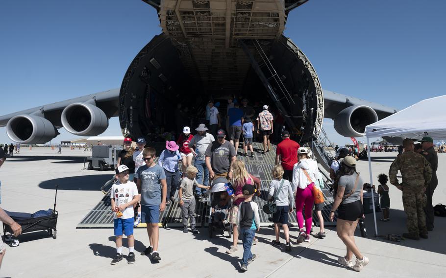 Spectators explore a C-5 Super Galaxy as part of the Warriors over the Wasatch air show at Hill Air Force Base, Utah, June 29, 2024. 