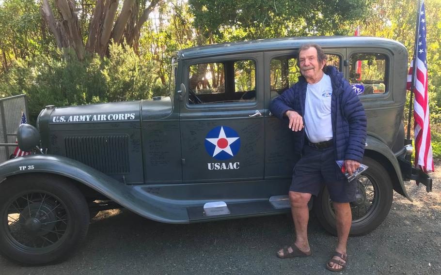 Jay Burbank of Cambria, Calif., takes a quick pause during his whirlwind packing and preparations for a 7,000-mile round trip he and a friend are taking to the Arctic Circle and back. He will drive about 1,400 miles of the trek in his 1931 Model A town sedan, honoring veterans and raising money for alternative-education graduates.