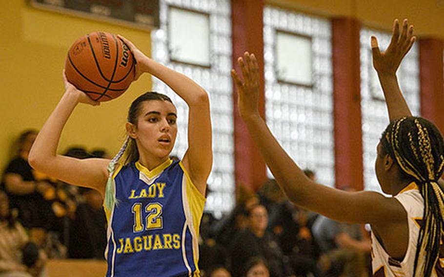 Sigonella’s Fabiola Mercado-Rodriguez looks to pass during a DODEA-Europe Division III basketball semifinal game Feb. 17, 2023, in Baumholder, Germany.