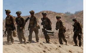 FILE PHOTO: U.S. soldiers participate in the live fire exercise during the annual joint military exercises between U.S. and Philippine troops called "Balikatan" or shoulder-to-shoulder, at Laoag, Ilocos Norte, Philippines, May 6, 2024. REUTERS/Eloisa Lopez/File Photo