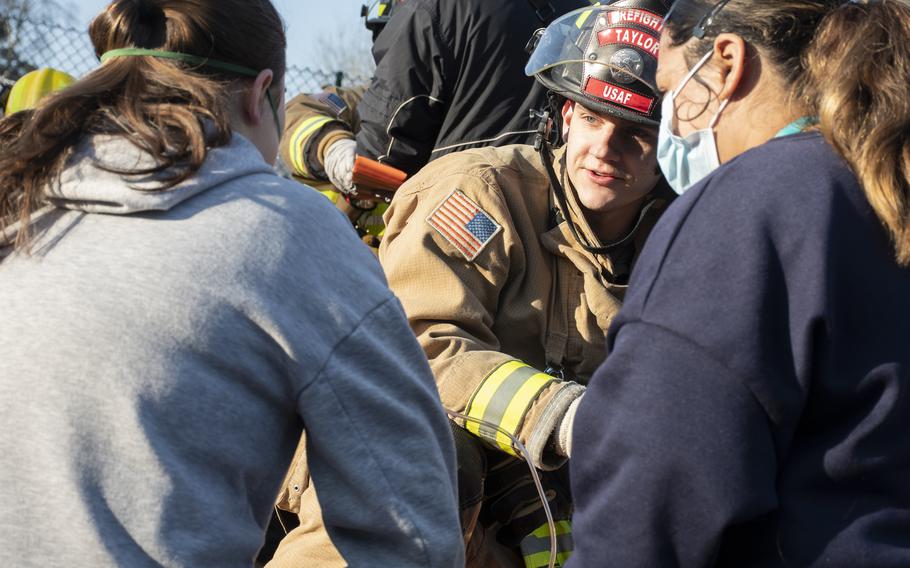 An American first responder questions two victims during a mass casualty response drill at Landstuhl Regional Medical Center, Germany, Thursday, March 10, 2022.
