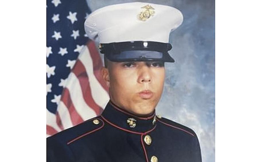 Toby Bowden is seen in his Marine Corps uniform. 