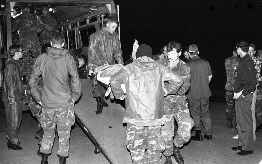 A burn victim on a stretcher.