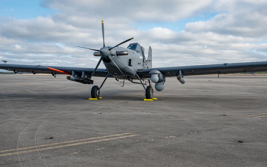 A U.S. Air Force OA-1K Skyraider II is parked on the flight line