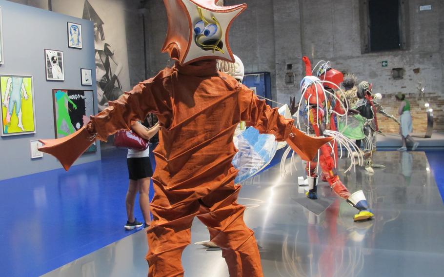 Weimar-era German dancer Lavinia Schulz and her husband, Walter Holdt, created fantastical costumes for dancers more than a century ago. "The Mask Dancers" is included in Venice's Art Biennale.