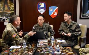 Gen. Park Jeong-hwan, chief of staff of the South Korea army, center, meets with the commander of the U.S. Army Space and Missile Defense Command, Lt. Gen. Daniel Karbler, right, at Redstone Arsenal, Ala., Jan. 24, 2023.