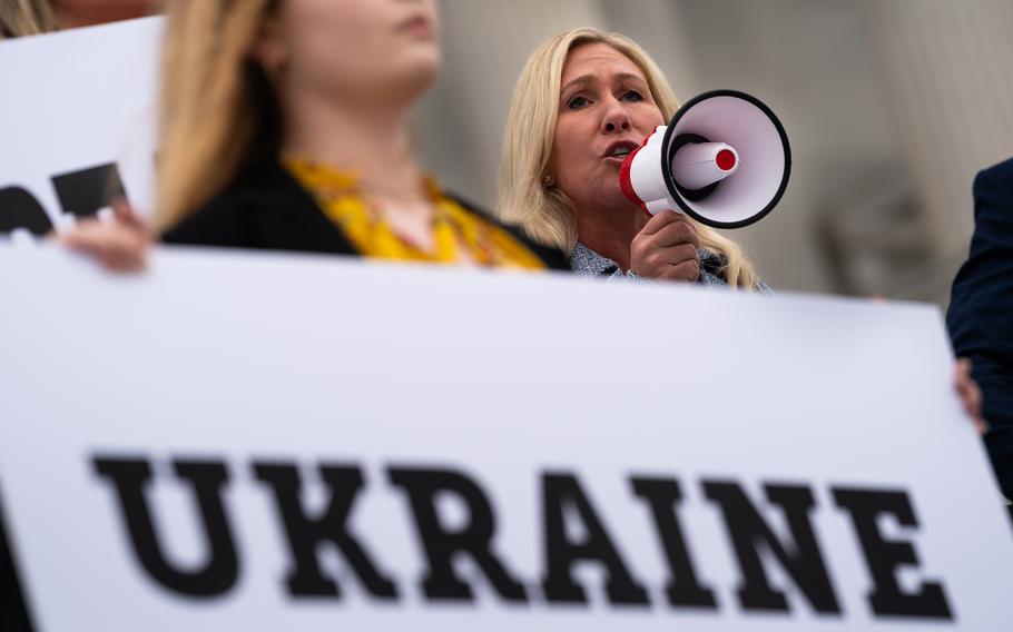 Rep. Marjorie Taylor Greene (R-Ga.), speaking outside the U.S. Capitol late last month, has become one of the most outspoken opponents of providing additional U.S. funding to Ukraine.