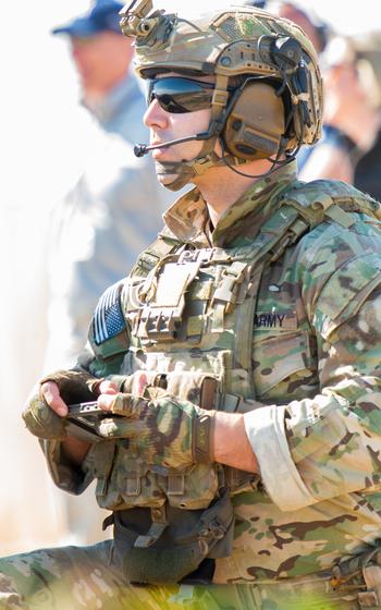 An Army Ranger from the 2nd Ranger Battalion, 75th Ranger Regiment controls a drone swarm during a demonstration March 5, 2024, during Project Convergence at Camp Pendleton, Calif. 