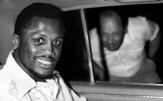 Frankfurt, Germany, May 14, 1971: Heavyweight boxing champion Joe Frazier is the victim of a pre-Internet photobomb as he sits in a car at the Frankfurt airport. Frazier, who kept his WBA and WBC titles with a unanimous decision over Muhammad Ali in March, was beginning a six-week tour of Europe as a singer. He would not box again until January, 1972.

Read the 1971 interview with the boxing legend here. https://www.stripes.com/news/joe-frazier-probably-won-t-fight-again-until-72-1.74025

Looking for Stars and Stripes’ historic coverage? Subscribe to Stars and Stripes’ historic newspaper archive! We have digitized our 1948-1999 European and Pacific editions, as well as several of our WWII editions and made them available online through https://starsandstripes.newspaperarchive.com/

META TAGS: Sport; Boxing; Joe Frazier; 