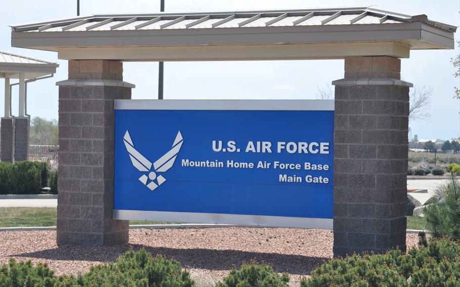 Blue sign at entrance to Mountain Home Air Force Base.