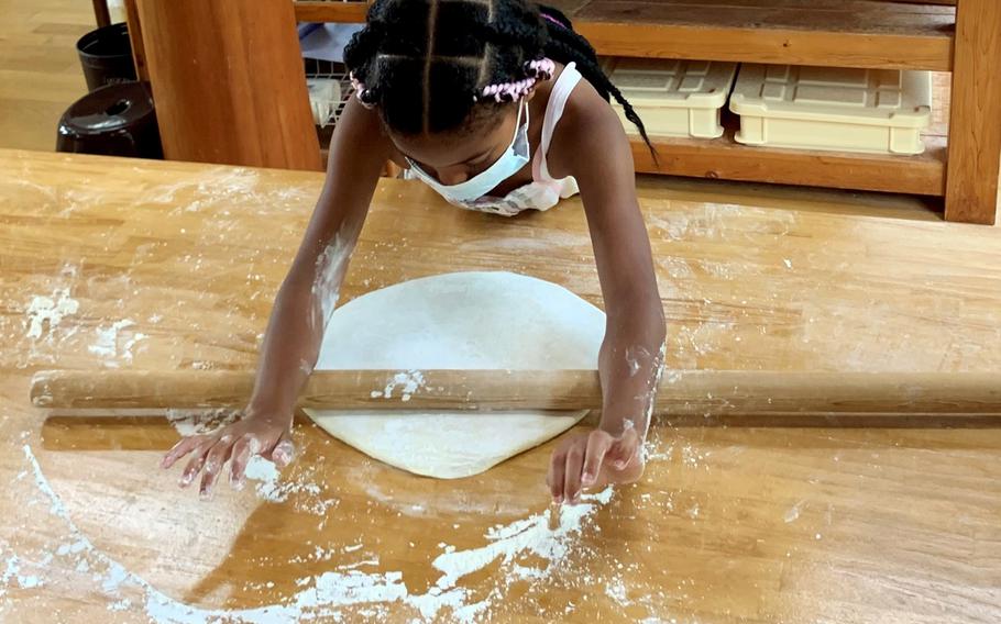 Rolling out udon noodle dough in the kitchen at Komatsuzawa Leisure Farm in Saitama prefecture, Japan, July 24, 2022.