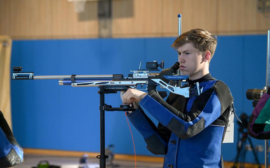 Ansbach’s Kenton Duplessie dials in his rifle during the DODEA-Europe marksmanship championship at Ansbach Middle High School on Jan. 27, 2024. Duplessie took home the titles in both the kneeling and prone positions. 