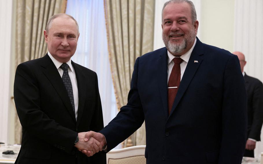 Russian President Vladimir Putin meets with Cuban Prime Minister Manuel Marrero Cruz at the Kremlin in Moscow on June 14, 2023. 