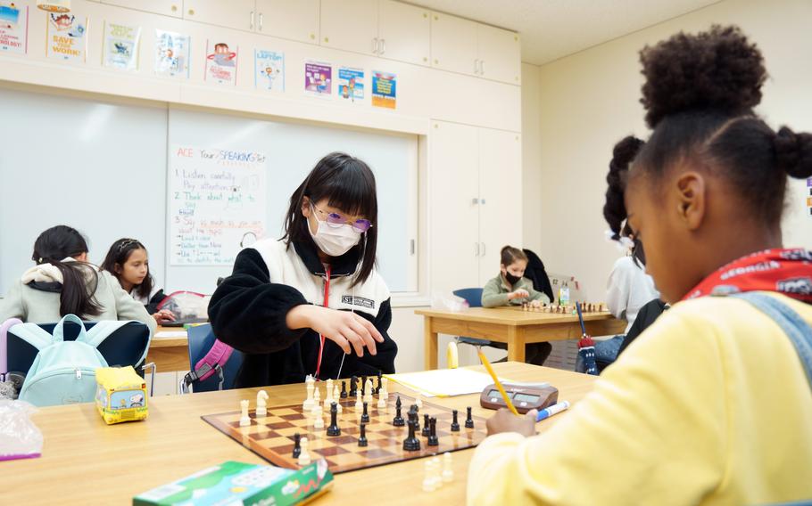 American and Japanese students compete in a chess tournament at Naval Air Facility Atsugi, Japan, Feb. 23, 2024.