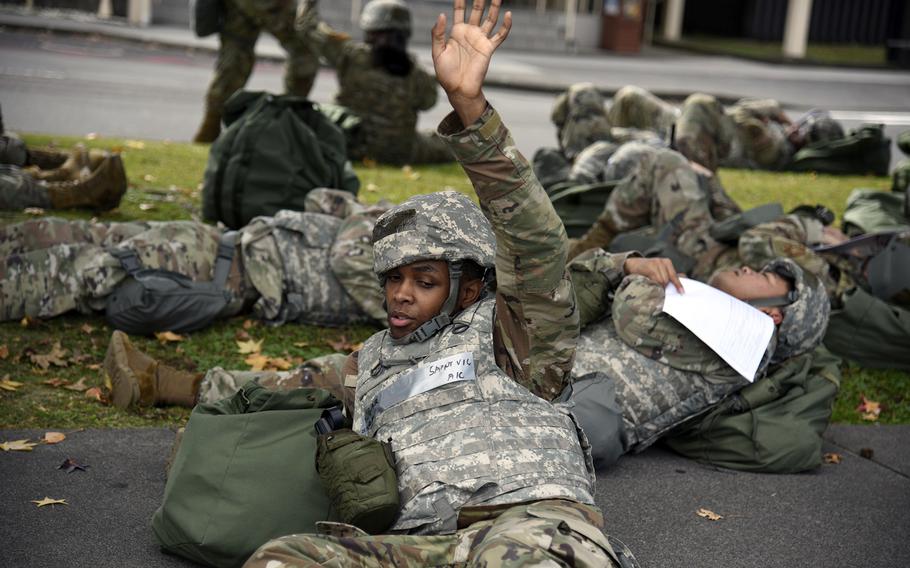 Airman 1st Class Edgar Saintvil portrays an airman injured by a drone strike during an exercise at Yokota Air Base, Japan, Oct. 20, 2023.