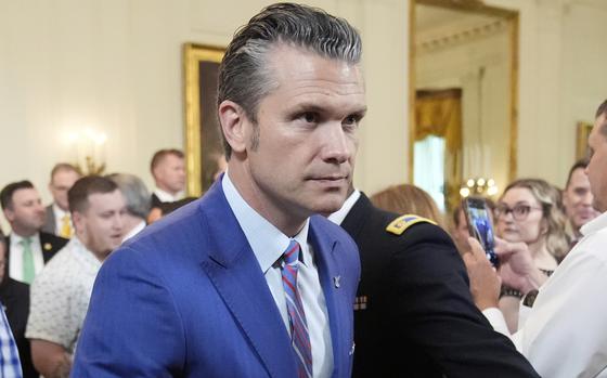 Defense Secretary Pete Hegseth departs an event to promote President Donald Trump's domestic policy and budget agenda in the East Room of the White House, Thursday, June 26, 2025, in Washington. (AP Photo/Mark Schiefelbein)