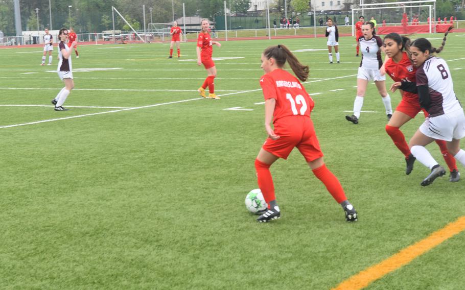 Kaiserslautern's Ally Montellano attempts to pass the ball away from Vilseck defenders during a a game on Saturday, April 30, 2022 played in Kaiserslautern, Germany.