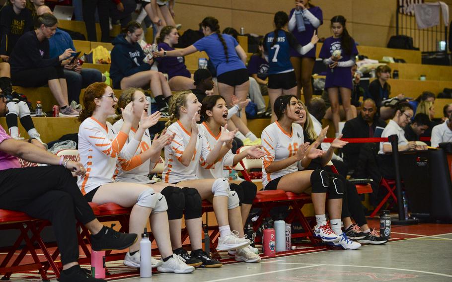 A group of Spangdahlem Sentinels enthusiastically cheer on their teammates during the DODEA Division III European volleyball fifth-place game on Oct. 27, 2023, in Kaiserslautern, Germany.