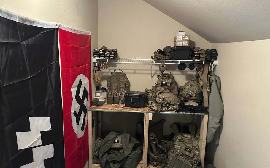 A cache of military weaponry and Nazi flags are seen in a home.