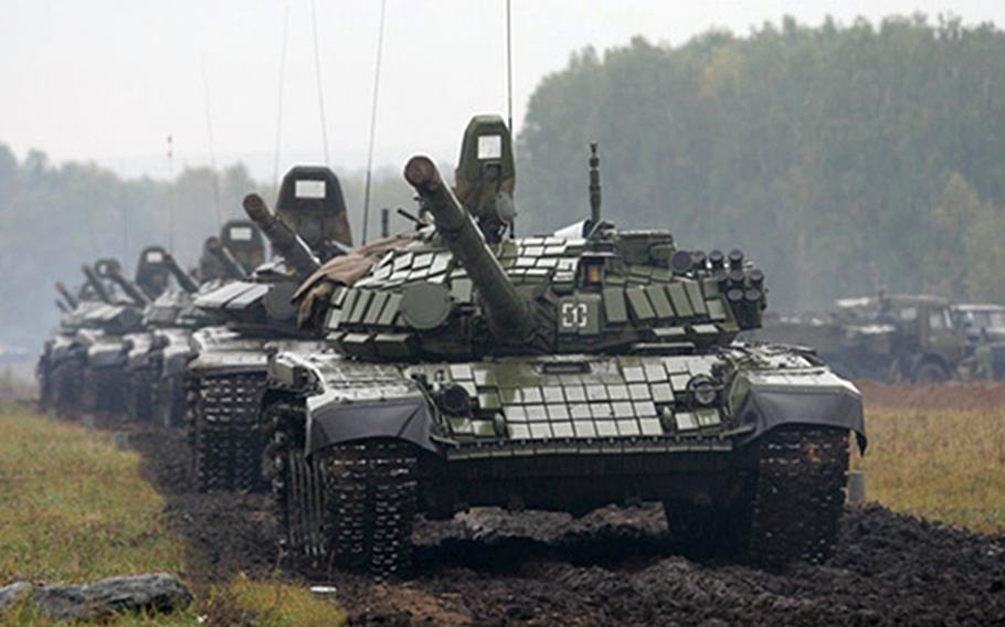 Russian tanks roll at the Pravdinsky range in Russia during Zapad 2017, a Russia-Belarus exercise. The countries say they will have about 12,800 troops taking part in this year's upcoming event, which takes place every four years.