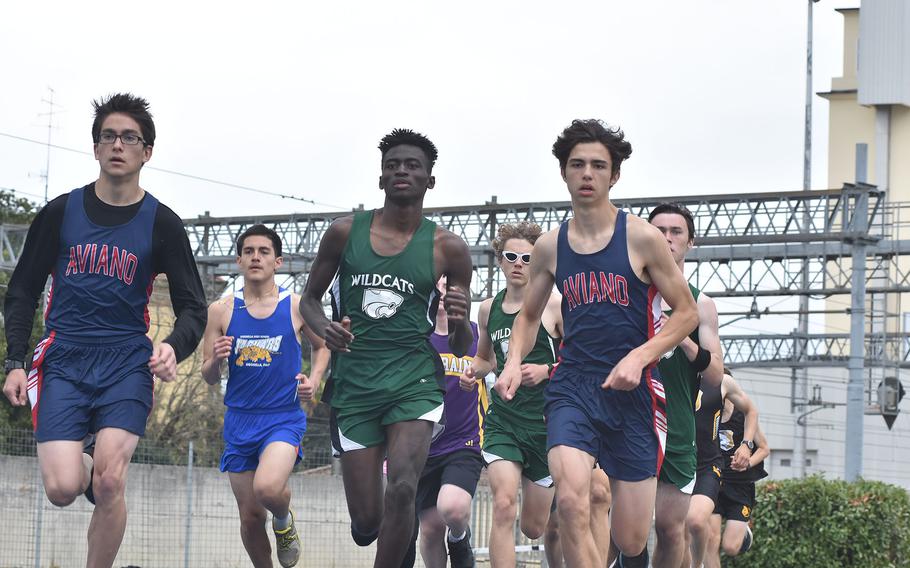 It was a crowded field after the first turn in the boys' 800-meter run Saturday, April 23, 2022, in Pordenone, Italy. Aviano's Everett Taylor, left, eventually won the race in a 1-2-3 finish for the Saints.