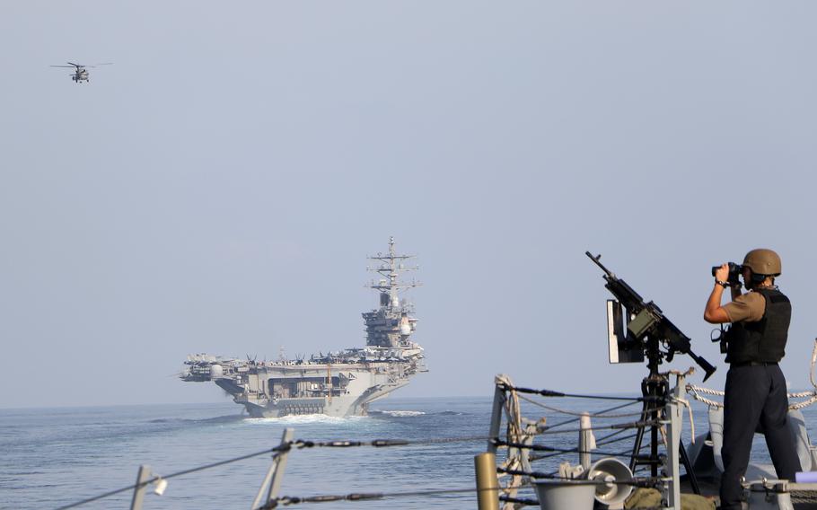 The aircraft carrier USS Dwight D. Eisenhower and its strike group transit the Strait of Hormuz, Nov. 26, 2023. An Iranian drone came within 1,500 yards of the carrier while it was conducting flight operations on Nov. 28. 