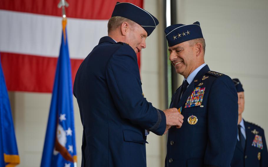 Air Force Gen. Tod D. Wolters, NATO supreme allied commander Europe, presents the Defense Distinguished Service Medal to Gen. Jeffrey L. Harrigian on June 27, 2022, at Ramstein Air Base, Germany. Harrigian relinquished command of U.S. Air Forces in Europe and Air Forces Africa and NATO Allied Air Command, headquartered at Ramstein, as well as his position as director of the Joint Air Power Competence Center at Kalkar, Germany, and is scheduled to retire after nearly 37 years of active duty service.
