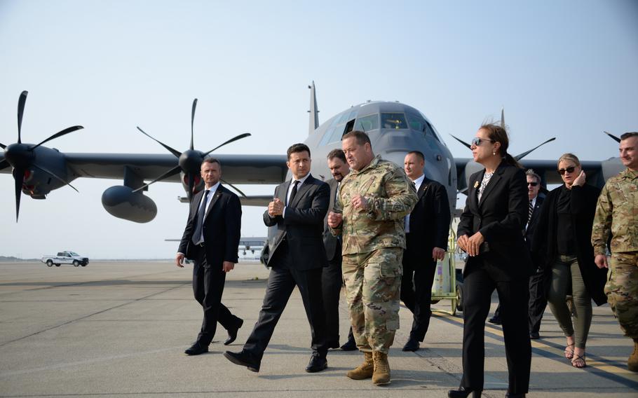 Army Maj. Gen. David Baldwin, adjutant general of the California National Guard, talks with Volodymyr Zelenskyy, president of Ukraine, and California Lt. Gov. Eleni Kounalakis, during their visit to the California Air National Guard’s 129th Rescue Wing at Moffett Air National Guard Base, Calif., in September 2021. 