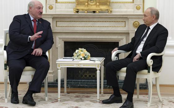 Russian President Vladimir Putin, right, listens to Belarus President Alexander Lukashenko during their meeting at the Kremlin in Moscow, Russia, Thursday, April 11, 2024. (Gavriil Grigorov, Sputnik, Kremlin Pool Photo via AP)