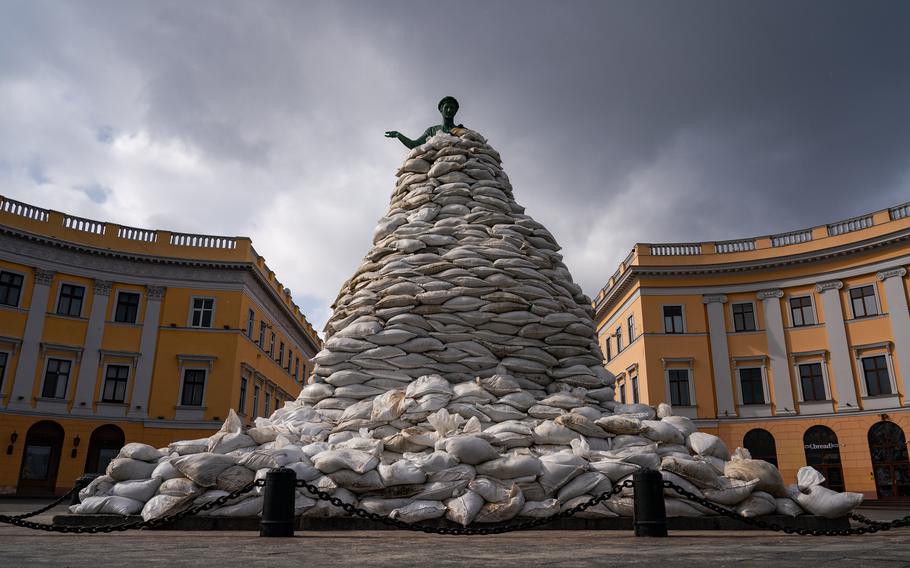 Volunteers put sandbags around the monument to the Duke of Richelieu for protection from a possible Russian attack on the city of Odessa, Ukraine, on March 10, 2022. 