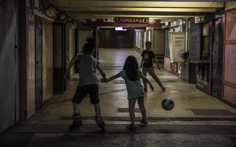 Children at play in a metro station where about 150 displaced residents are living in the Saltivka neighborhood in the city of Kharkiv, Ukraine, on Aug. 11, 2022. 