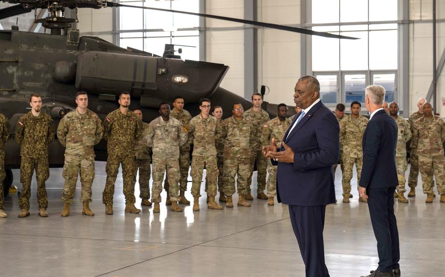 Defense Secretary Lloyd Austin addresses U.S. and Latvian soldiers at Lielvarde Air Base, Latvia, in August 2022. Austin will visit Fort Bragg, N.C., on Tuesday, Nov. 1, 2022, to meet with 18th Airborne Corps soldiers who just returned from a nine-month deployment to Europe in response to Russia’s invasion of Ukraine.