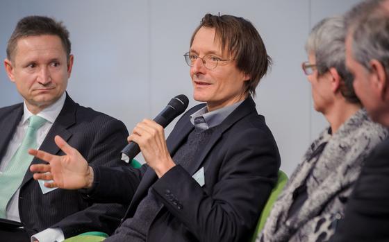 Karl Lauterbach, then-health policy spokesman, in center, speaks at an event on February 11, 2013. Health Minister Karl Lauterbach said the legalization of cannabis is necessary to end Germany’s “unsuccessful fight against drug-related crime,” and its flourishing black market. 