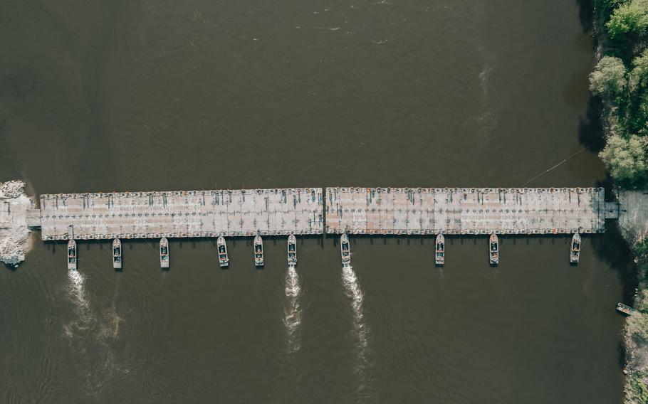 The 74th Multi-Role Bridge Company, deployed from Fort Hood, Texas, to Poland employs a float ribbon bridge system across the Vistula River between Ryki and Kozienice, Poland, May 13, 2022. The float bridge, which came from Army Field Support Battalion-Benelux’s APS-2 worksite in Zutendaal, Belgium, was used by U.S., Polish, French and Swedish military forces to cross the river as part of the Defender-Europe 22 exercise. 