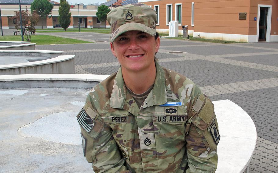 Staff Sgt. Ariana Perez was thrilled and relieved to earn her Expert Infantryman Badge, pinned on at a Nov. 9, 2022, ceremony in Vicenza, Italy.