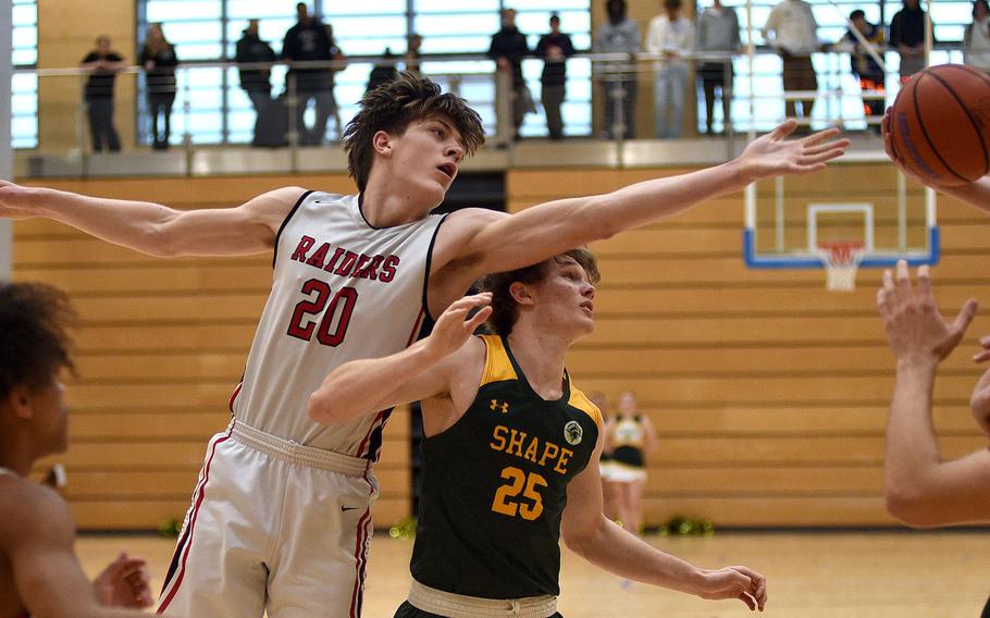 Garrett Vitter reaches for a rebound.