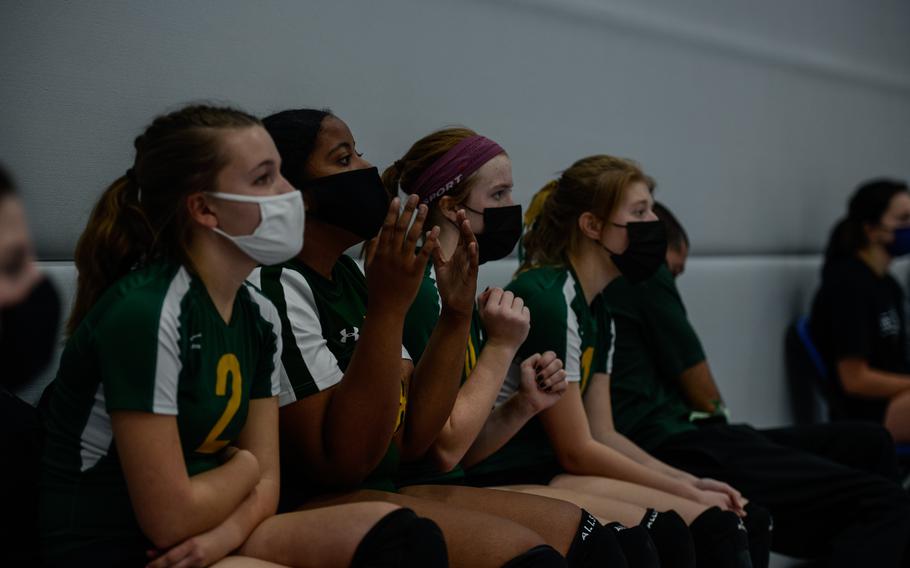 Tyshia Davis of the SHAPE Spartans, second from left, looks on in frustration as her team falls behind against the Stuttgart Panthers in their second game of the DODEA-Europe Division I Volleyball Tournament Oct. 29, 2021, at Ramstein Air Base, Germany. 