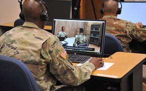 A soldier works on a distance learning course at Fort Bliss, Texas in 2018. The Army is eliminating approximately 346 hours of online courses, including training on the enlisted and officer sides.